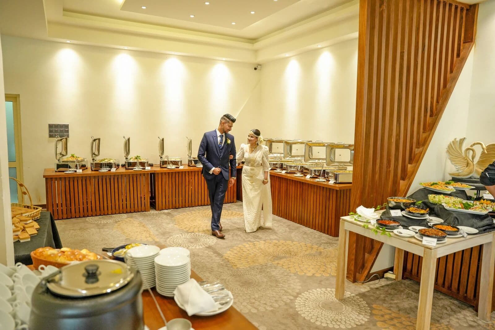 A buffet laid along the wall in Ambrosia
